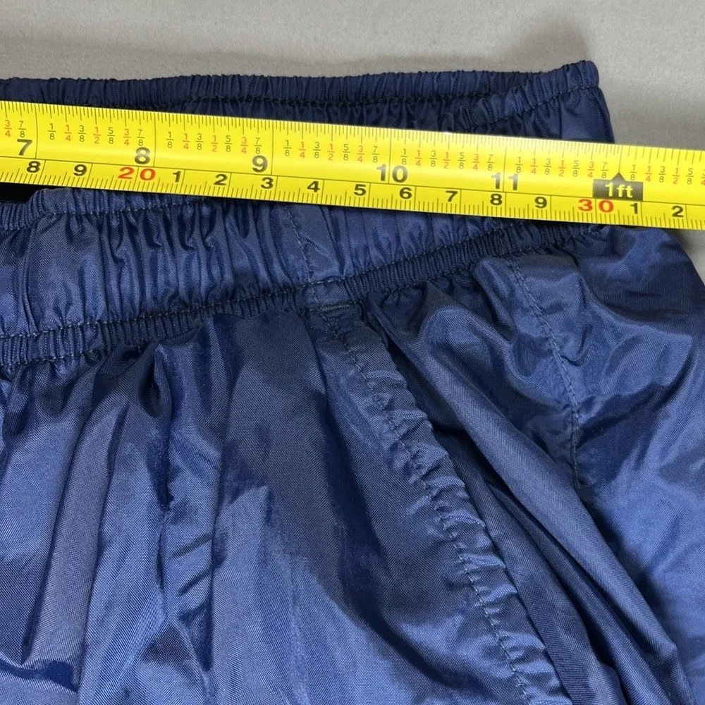 Vintage Nike Youth M (8-10) Blue Nylon Track Pants Zip Ankle Cinch Waist Retro